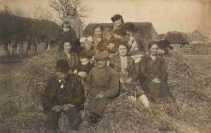 The family in Vindeby. Carla Madsen in the front row to the right. Next to her her sister, Marie Christine, probably a brother and Marie's husband Rasmus Rasmussen. In the back are the sisters Severine, Anna, Nelly and Inger with their children.  The photo was taken in 1928.